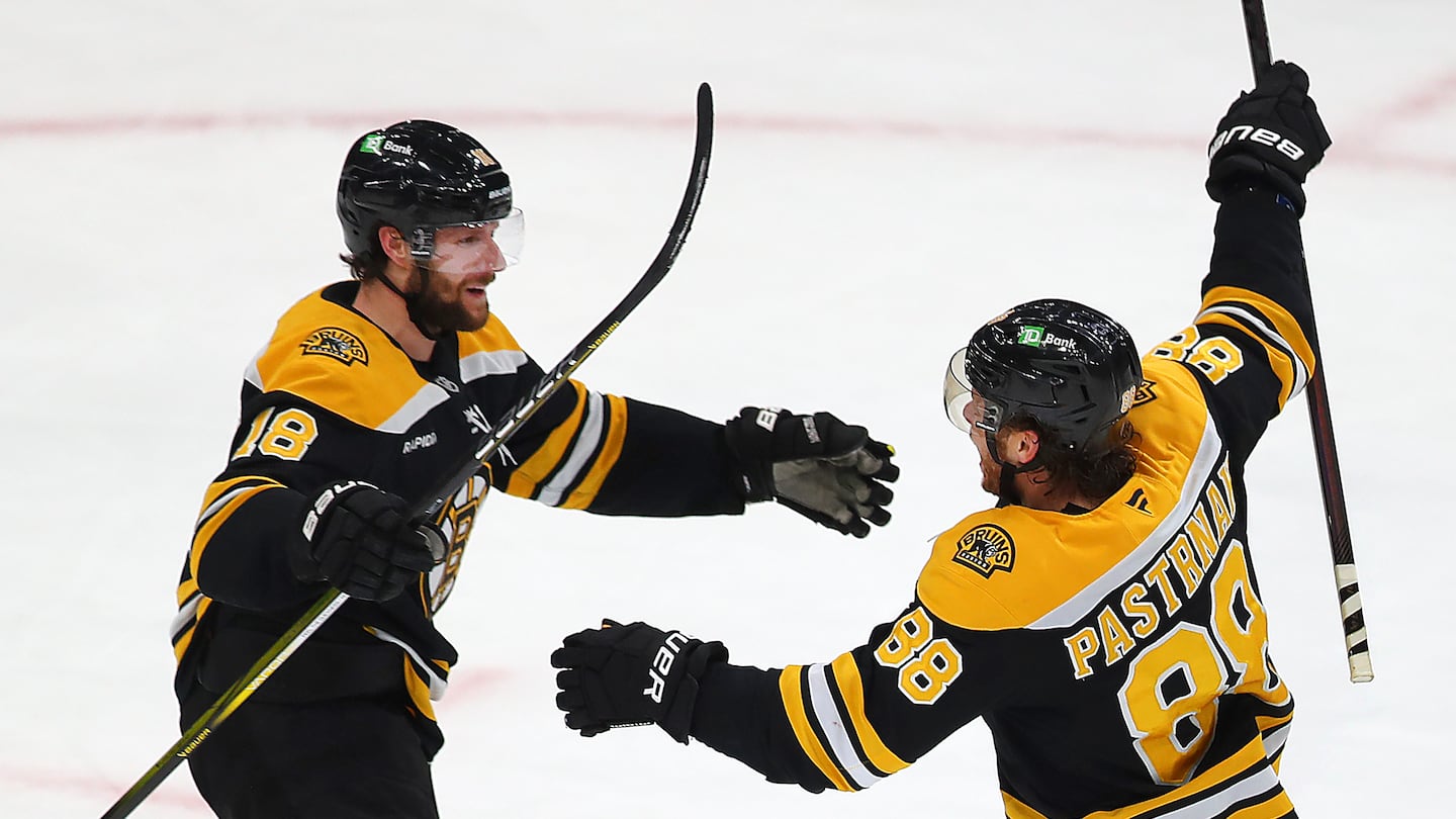 Pavel Zacha (left) celebrated with David Pastrnak after scoring the winning goal to beat the Flyers in overtime.