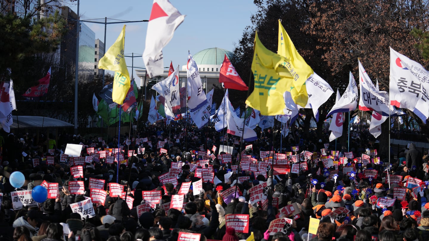 Demonstrators called for the impeachment of President Yoon Suk Yeol of South Korea, days after his brief declaration of martial law, outside the National Assembly in Seoul, on Saturday.