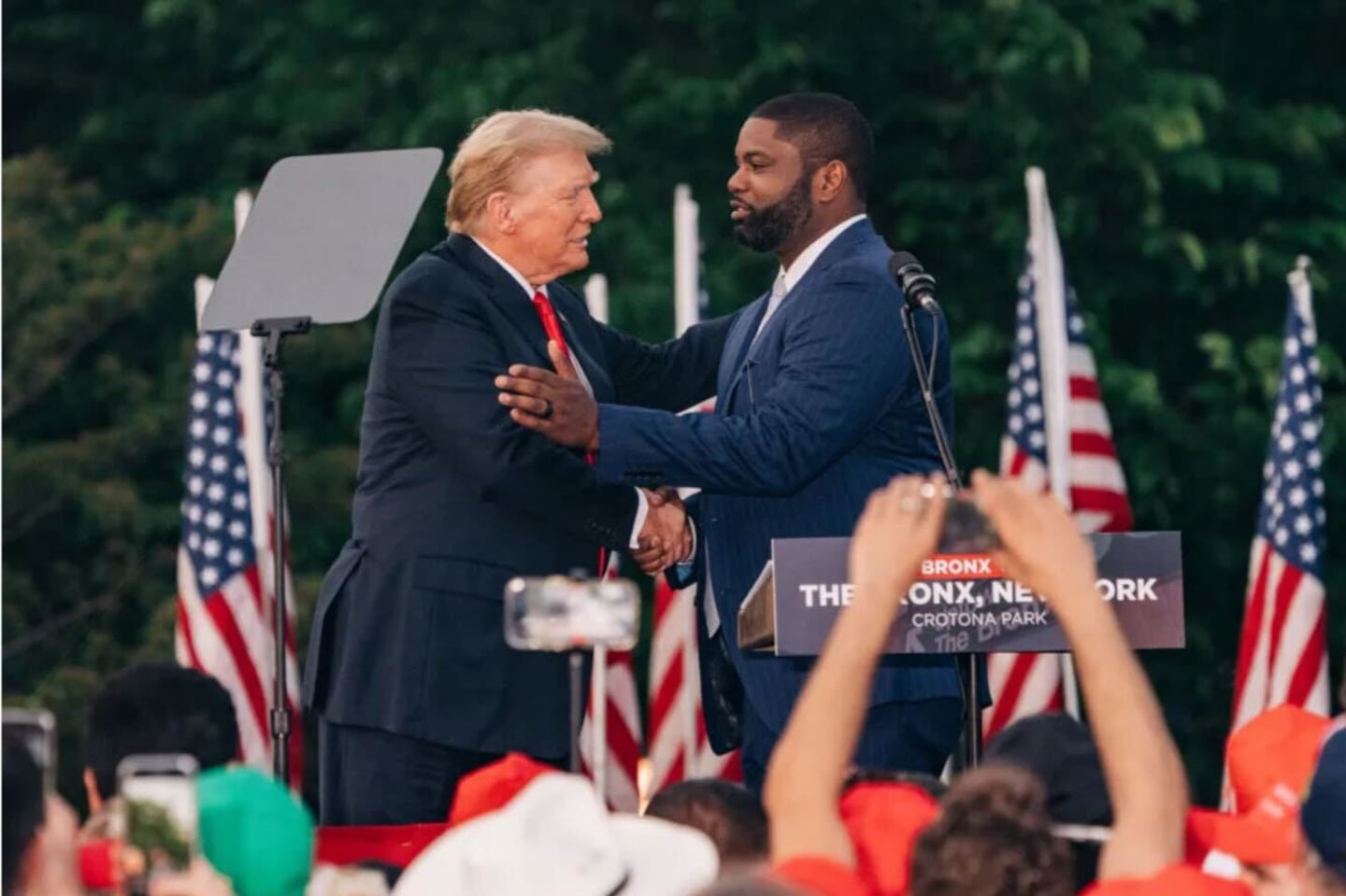 Donald Trump greets Representative Byron Donalds of Florida during a May campaign rally in the Bronx.