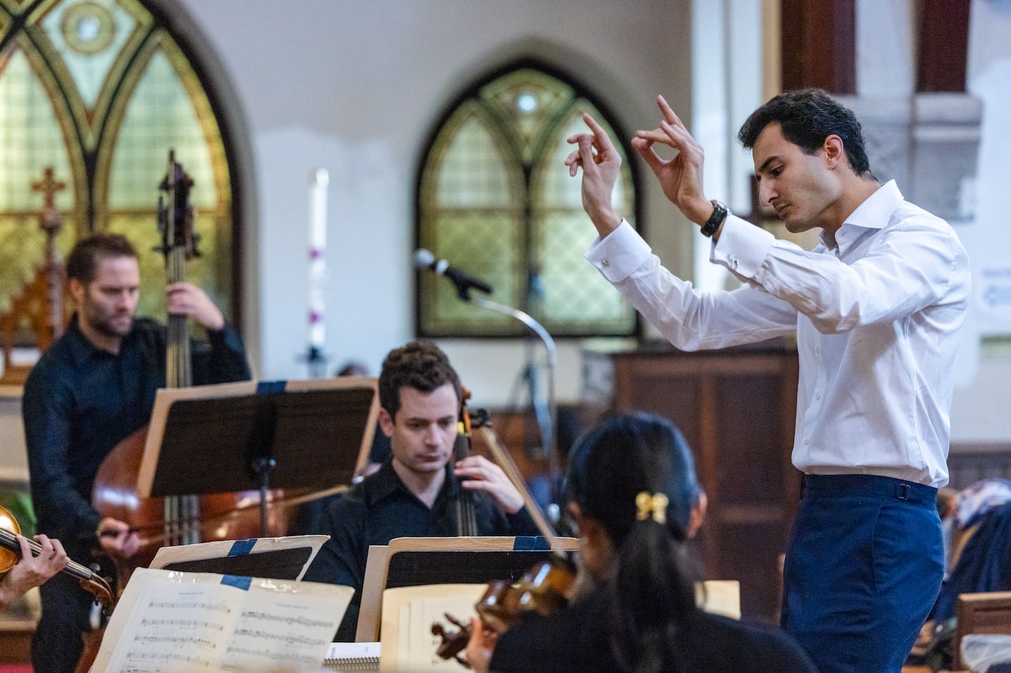 Samy Rachid rehearsing for a concert at St. John's Episcopal.