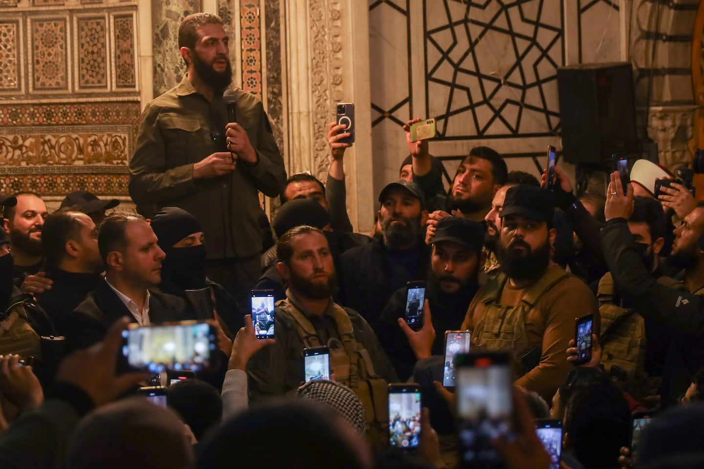 Abu Mohammed al-Golani, an insurgent leader, spoke on Sunday at the Umayyad Mosque in Damascus.