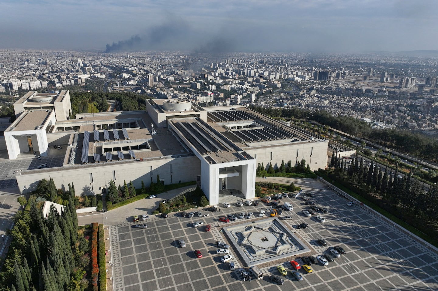 The Syrian presidential palace in Damascus on Sunday, after Islamist-led rebels declared that they have taken the Syrian capital in a lightning offensive, sending President Bashar Assad fleeing and ending five decades of Baath rule in Syria.