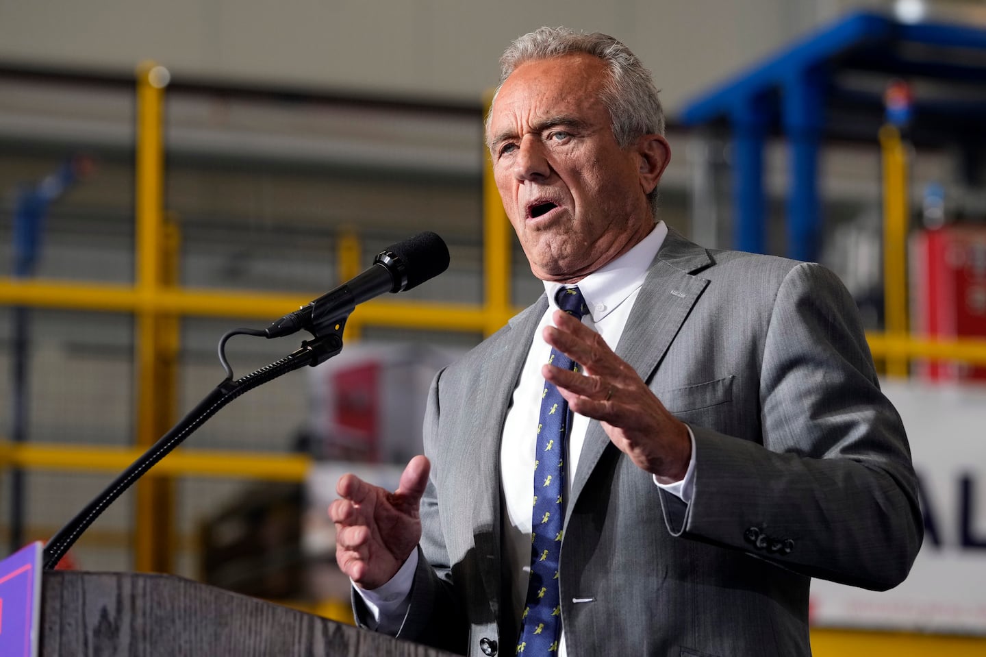 Robert F. Kennedy, Jr., speaks before Donald Trump at a campaign event, Sept. 27, 2024 in Walker, Mich.