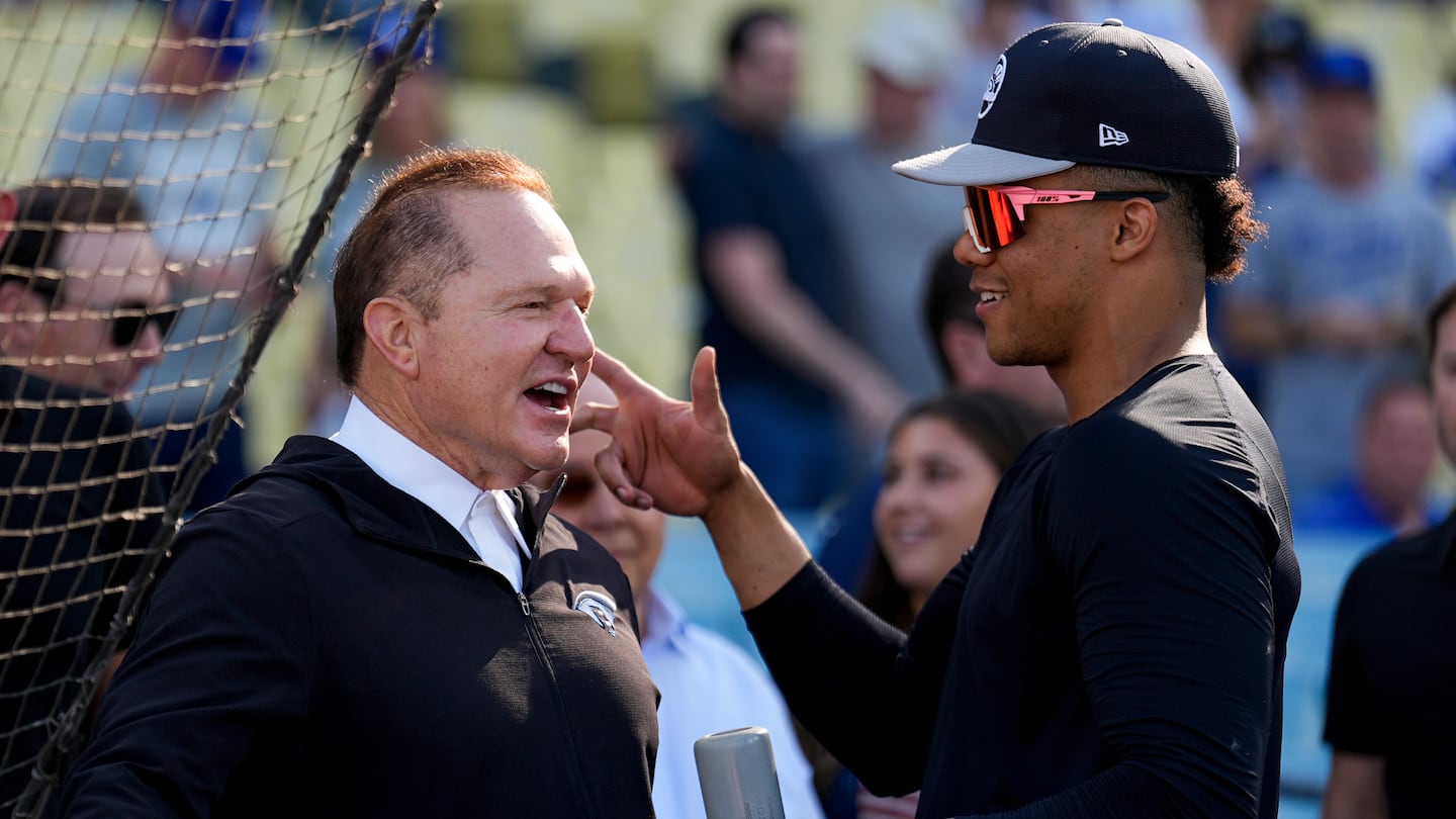 Agent Scott Boras (left) reeled in the largest contract in team sports for Juan Soto with the 15-year, $765 million deal with the Mets.