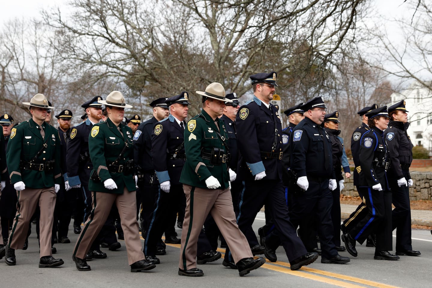 Law enforcement around New England attend the wake for Endicott College Sgt.