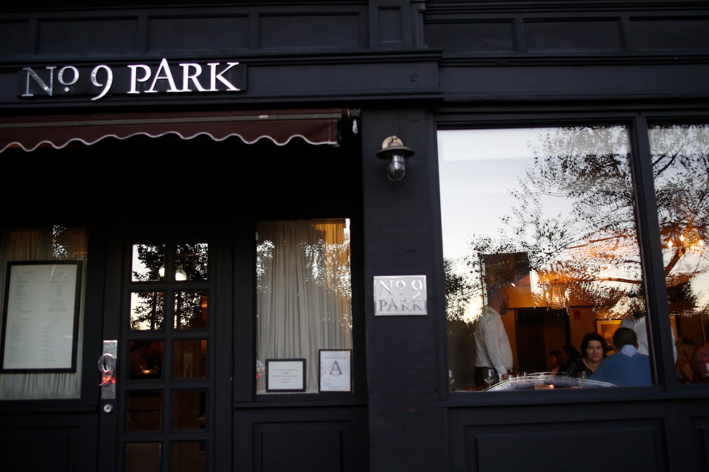 A group of investors has agreed to purchase No. 9 Park, Barbara Lynch's first restaurant, but that deal is in limbo amid a lawsuit over unpaid personal property taxes, Lynch's chief operating officer says.