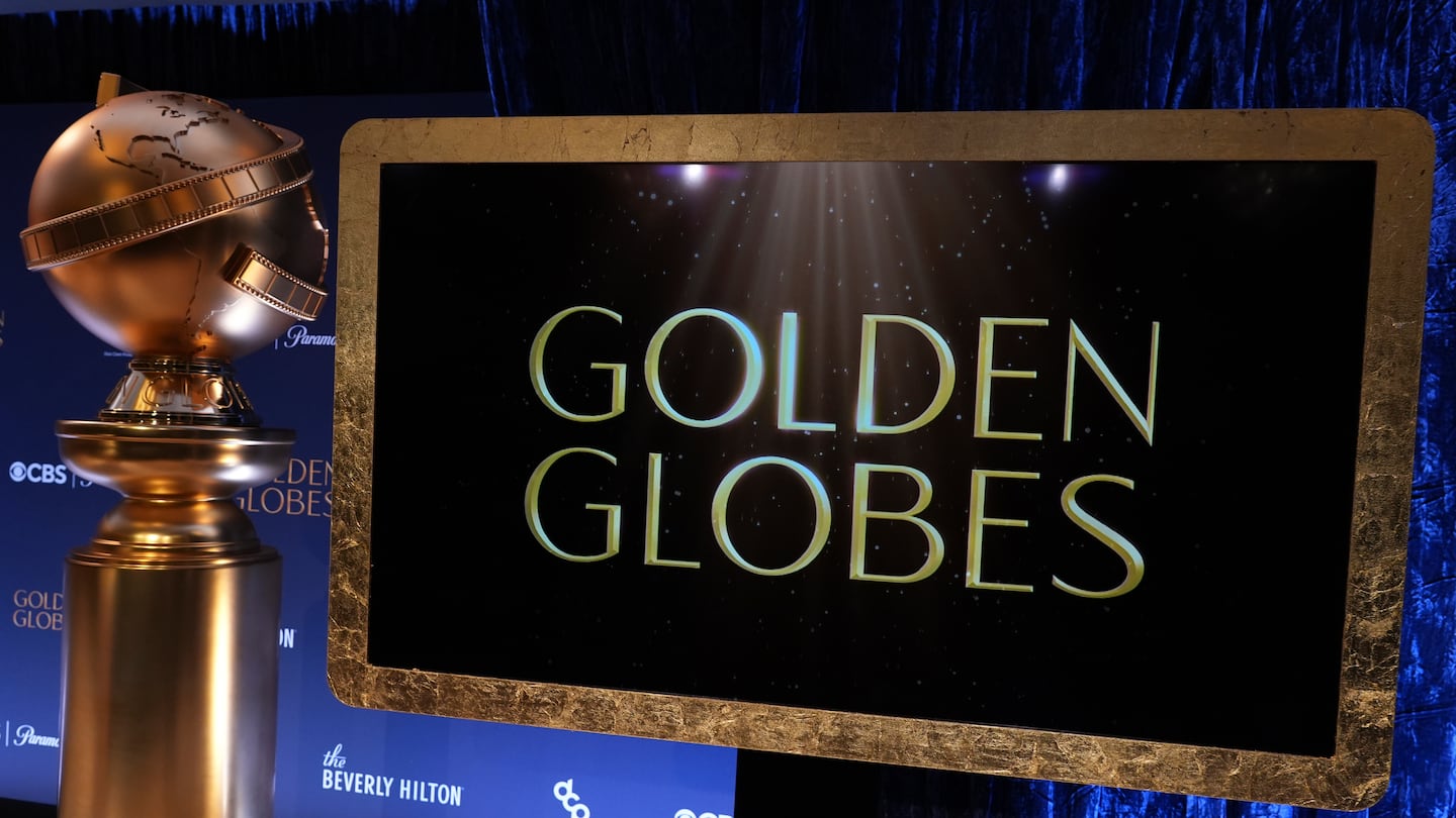 A replica of a Golden Globes statue appears prior to the nominations announcement for the 82nd Golden Globes on Monday at the Beverly Hilton Hotel in Beverly Hills. The 82nd Golden Globes will be held on Jan. 5.