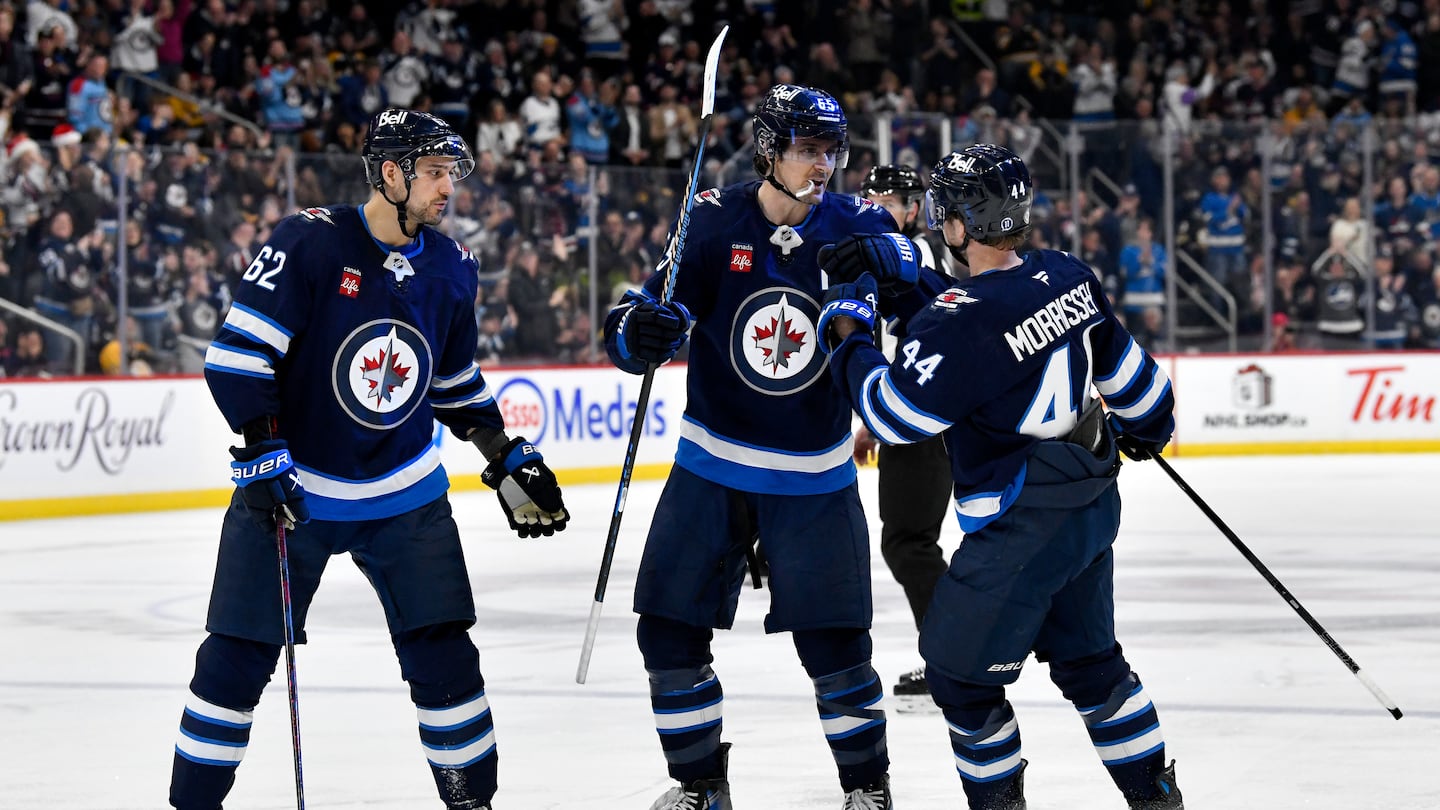 Winnipeg had plenty of goal celebrations against the Bruins Tuesday night, including this one in the second period on Mark Scheifele's (center) second of the night.