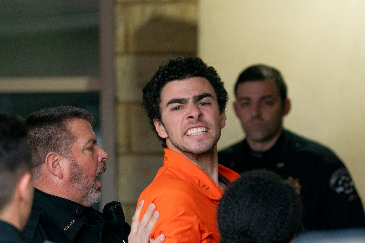 Suspect Luigi Mangione is taken into the Blair County Courthouse on Tuesday, Dec. 10, 2024, in Hollidaysburg, Pa.