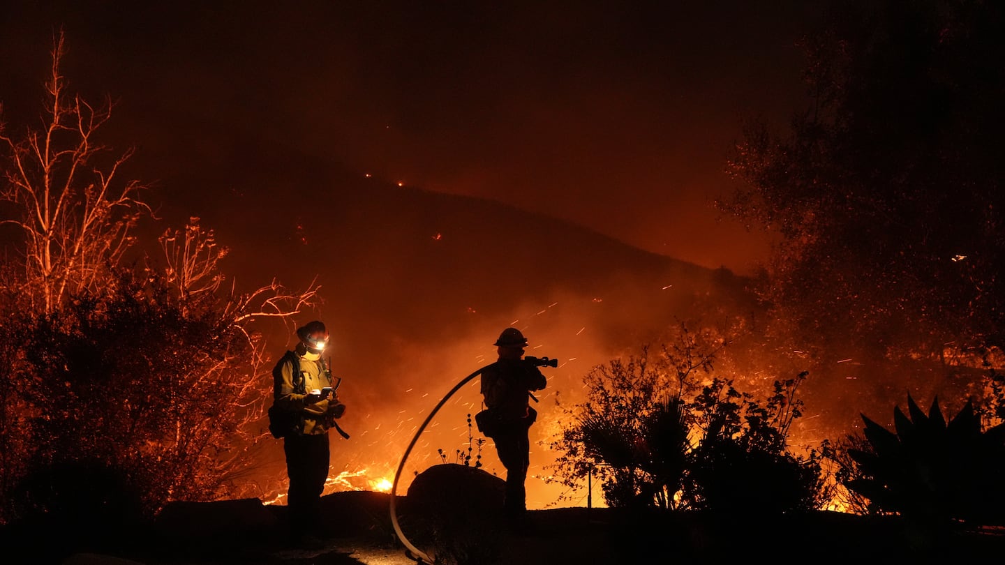 Firefighters battle the Franklin Fire in Malibu, Calif., on Dec. 10.