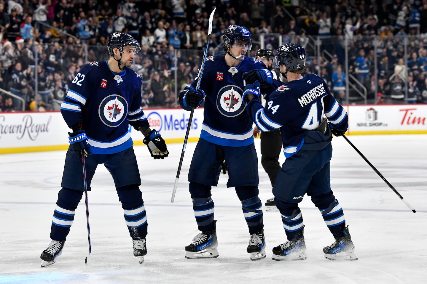 Winnipeg had plenty of goal celebrations against the Bruins Tuesday night, including this one in the second period on Mark Scheifele's (center) second of the night.