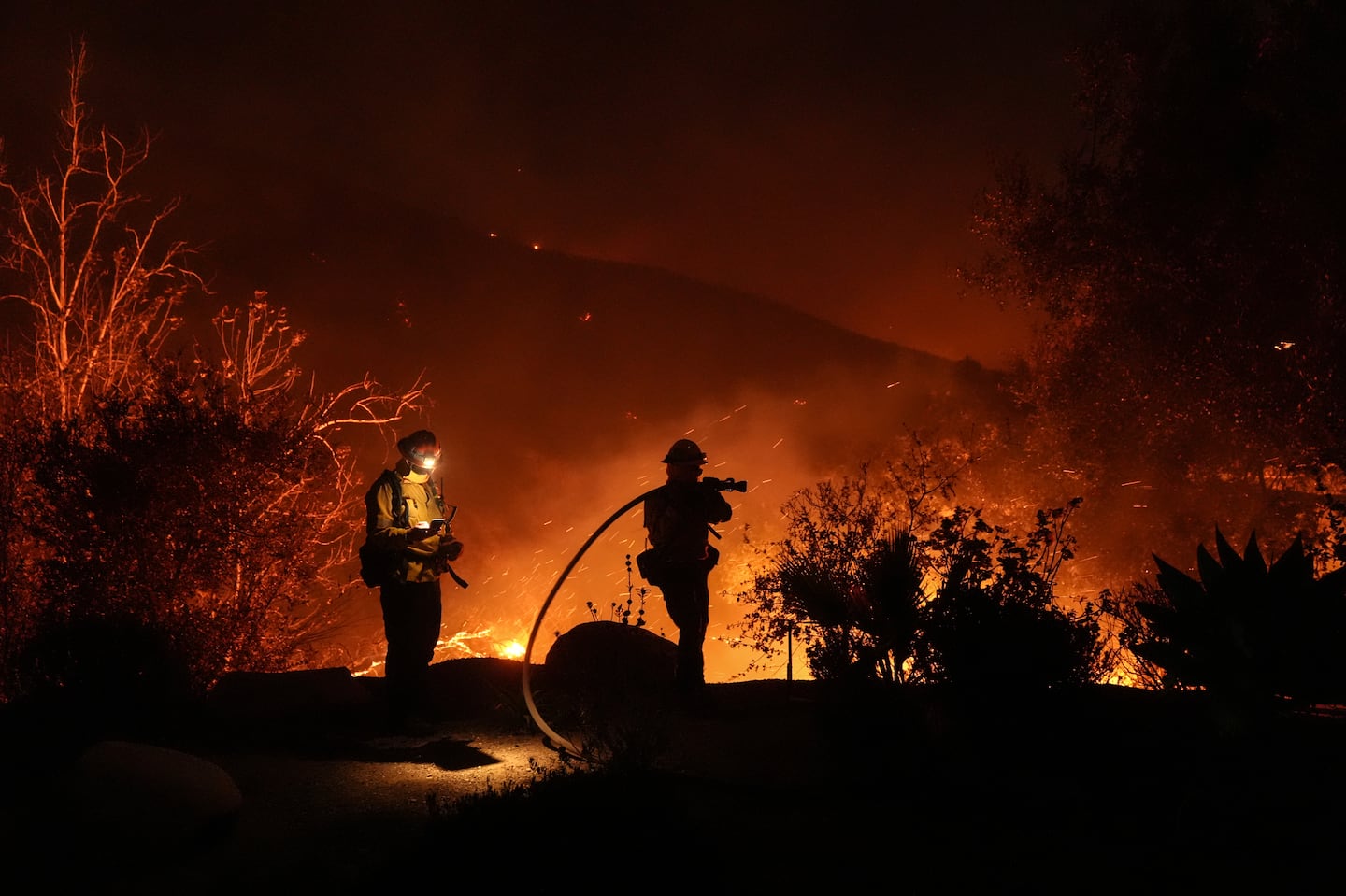 Firefighters battle the Franklin Fire in Malibu, Calif., on Dec. 10.