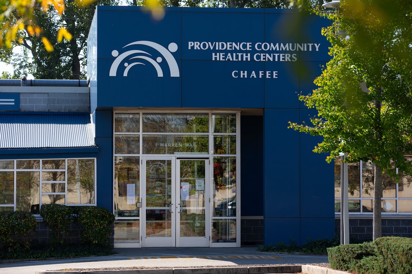 A sign welcomed visitors at the front entrance of the Providence Community Health Centers Chafee at One Warren Way in Providence, R.I., in 2023.