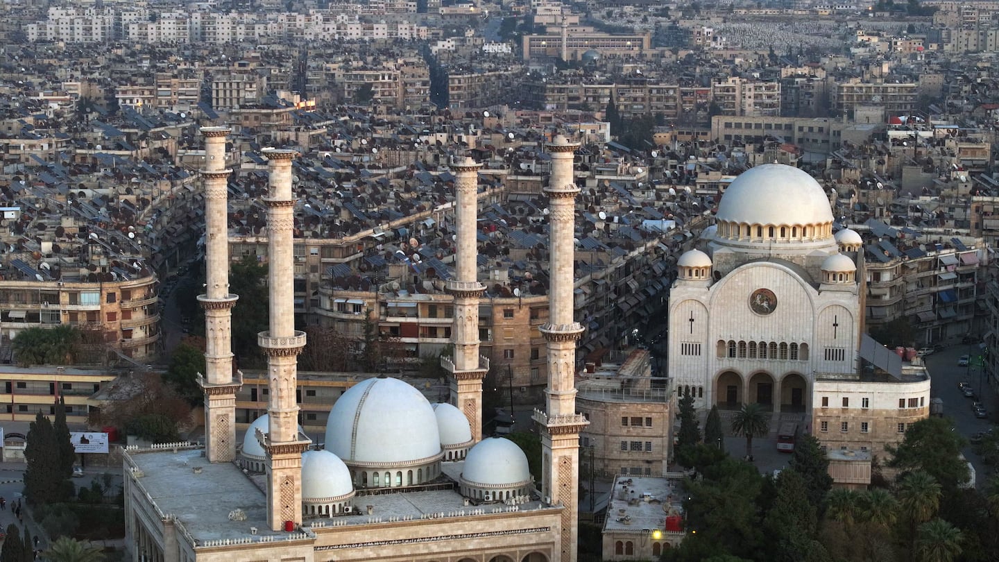 This aerial view of Aleppo, Syria, shows the Al Tawheed Mosque, left, and the Greek Catholic Cathedral of Aleppo, right. Christians accounted for about 10 percent of the Syrian population before the civil war began in 2011, but many have since fled the country.