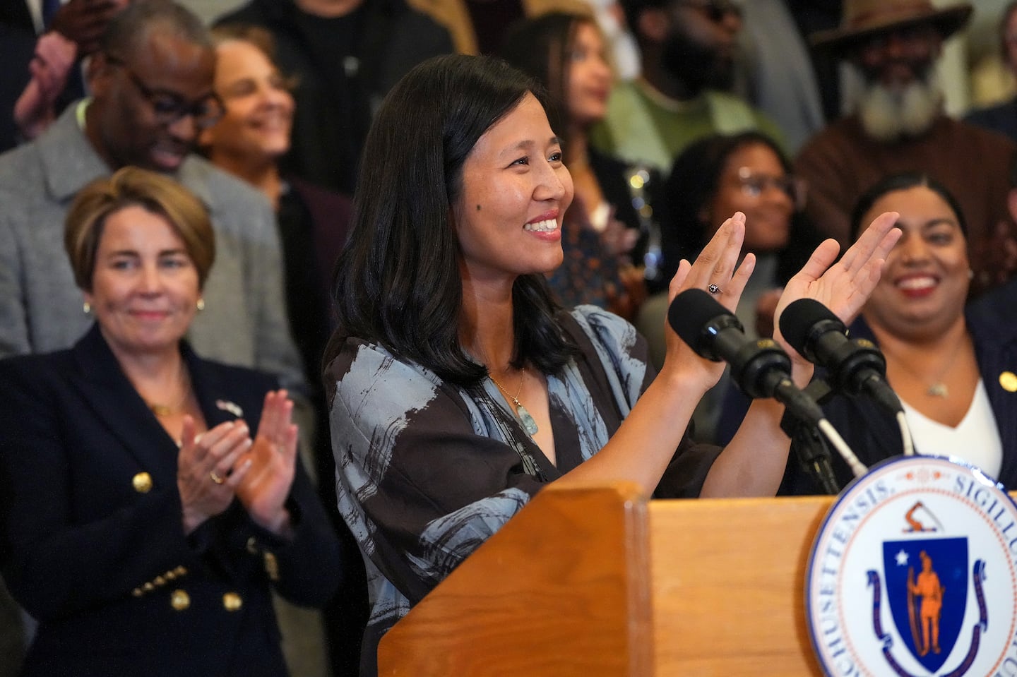 Boston Mayor Michelle Wu is pictured celebrating the Legislature's approval of additional liquor licenses for Boston businesses earlier this year.