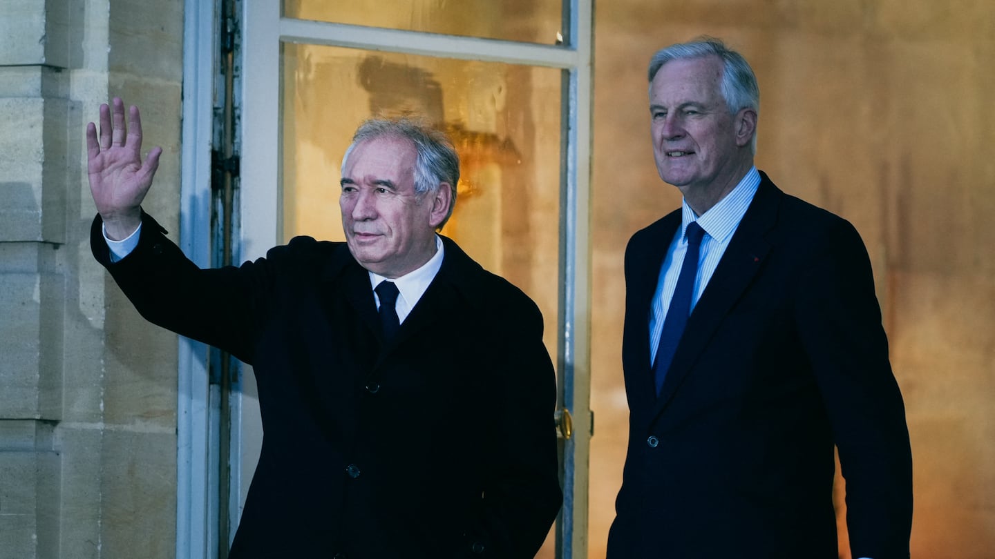 France's former prime minister Michel Barnier (right), welcomed new Prime Minister Francois Bayrou during the handover of power at the Matignon Hotel in Paris France on Friday.