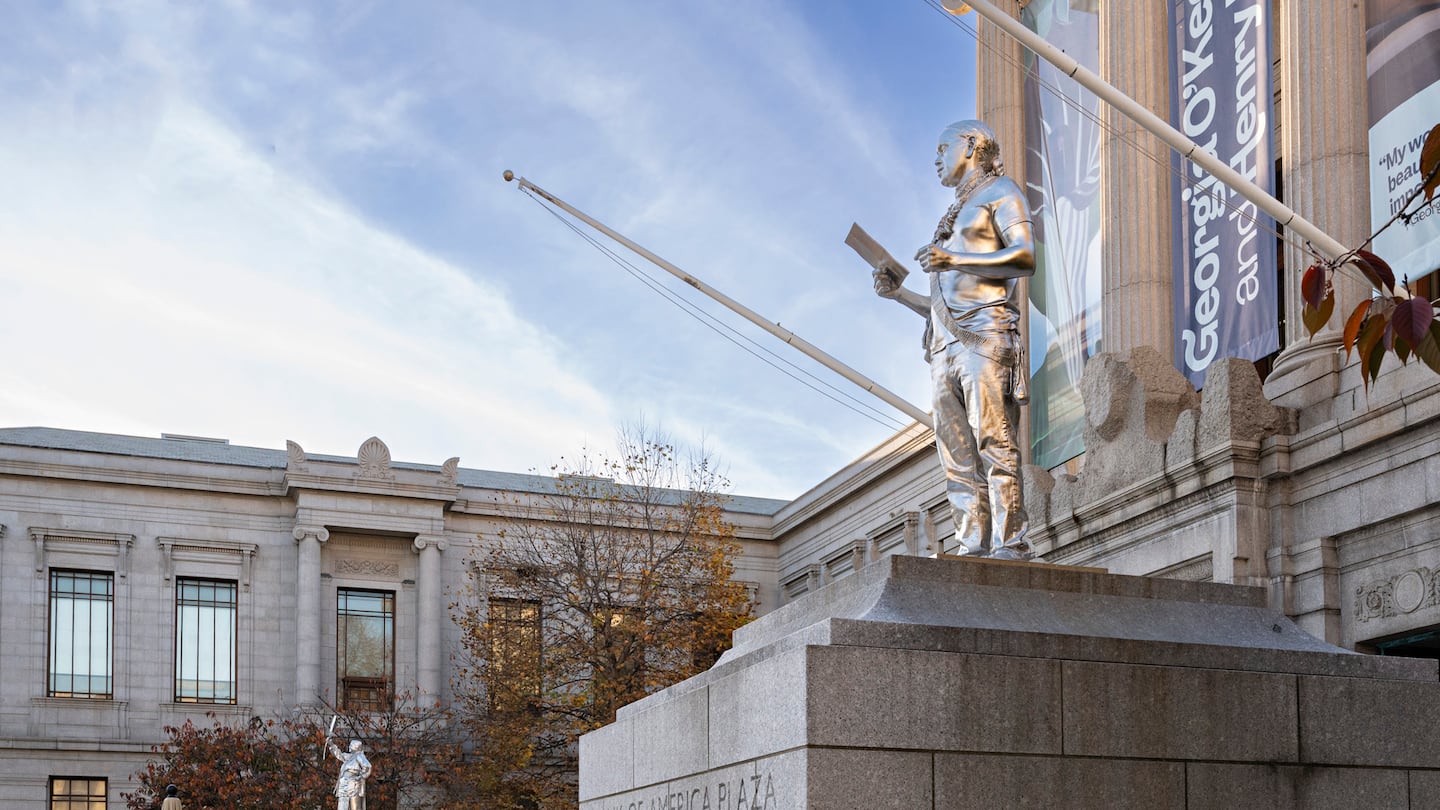 Alan Michelson's "The Knowledge Keepers," a pair of chromium-sheen sculptures of two current Native American cultural leaders, Julia Marden and Andre StrongBearHeart Gaines Jr.,  was installed at the main entrance of the Museum of Fine Arts in November. (Museum of Fine Arts, Boston)