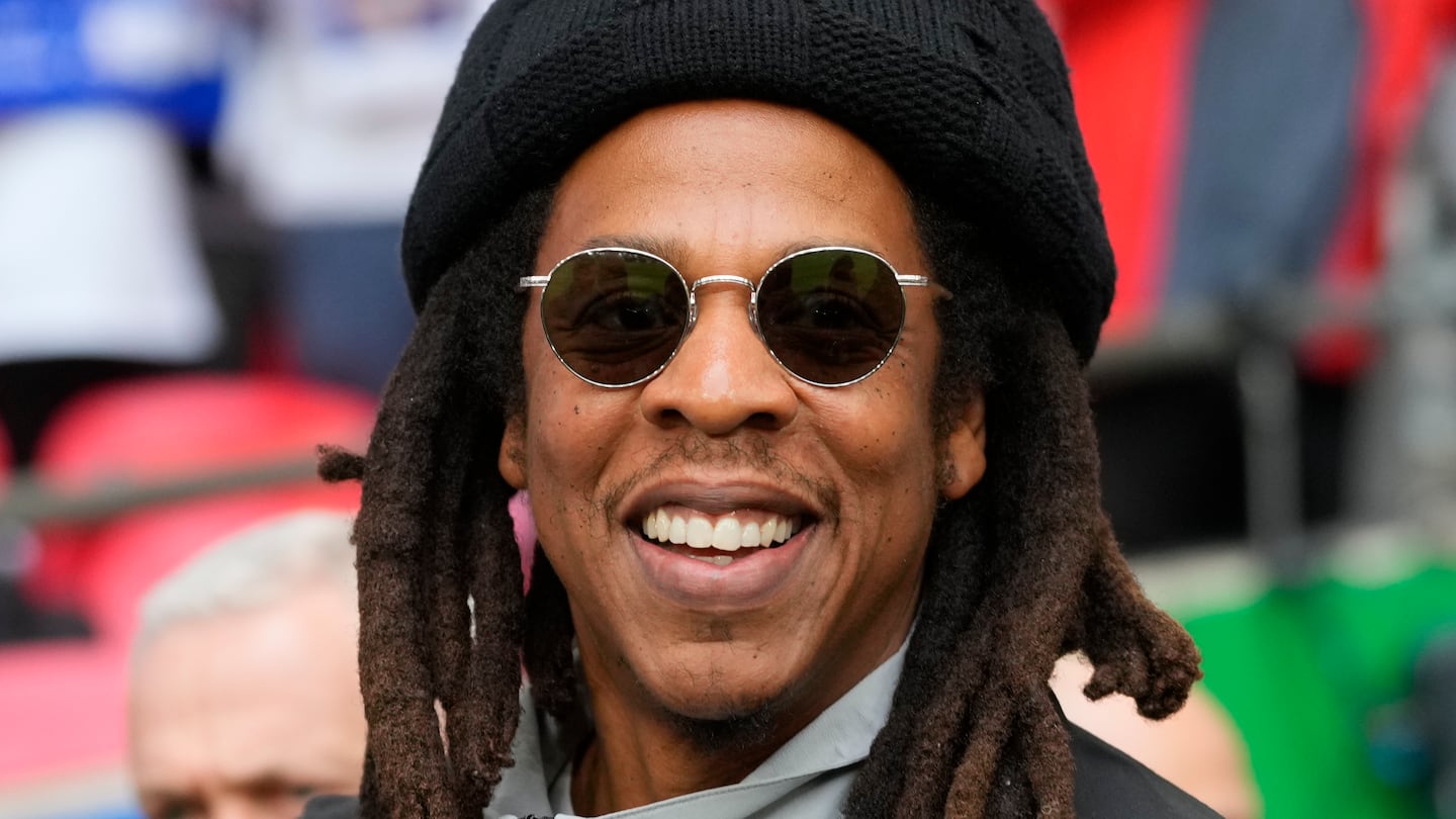 Jay-Z smiles ahead of the Champions League final soccer match between Borussia Dortmund and Real Madrid at Wembley stadium in London, on June 1.