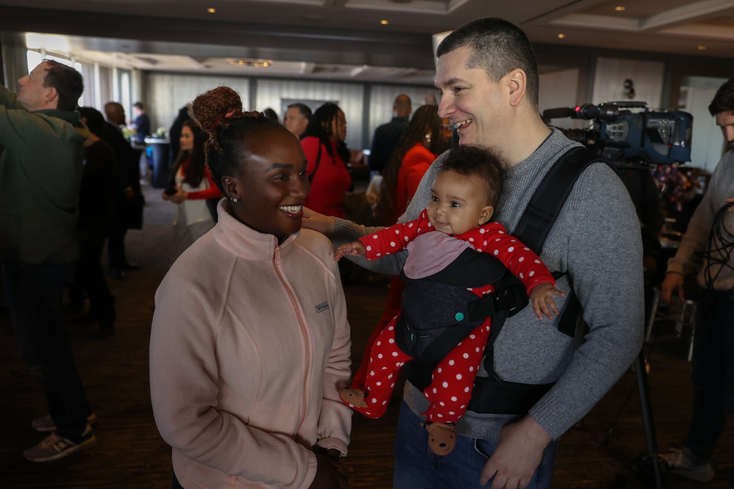 Jemimah Kovacevic with her daughter Myla and her husband, Nikola, at an event hosted by Boston Mayor Michelle Wu to celebrate new home ownership for residents who this year purchased their first homes in Boston with assistance from the city. In 2024, the Mayor’s Office of Housing's Boston Home Center helped 235 households purchase a home in the city. The celebration was at the University of Massachusetts Club.