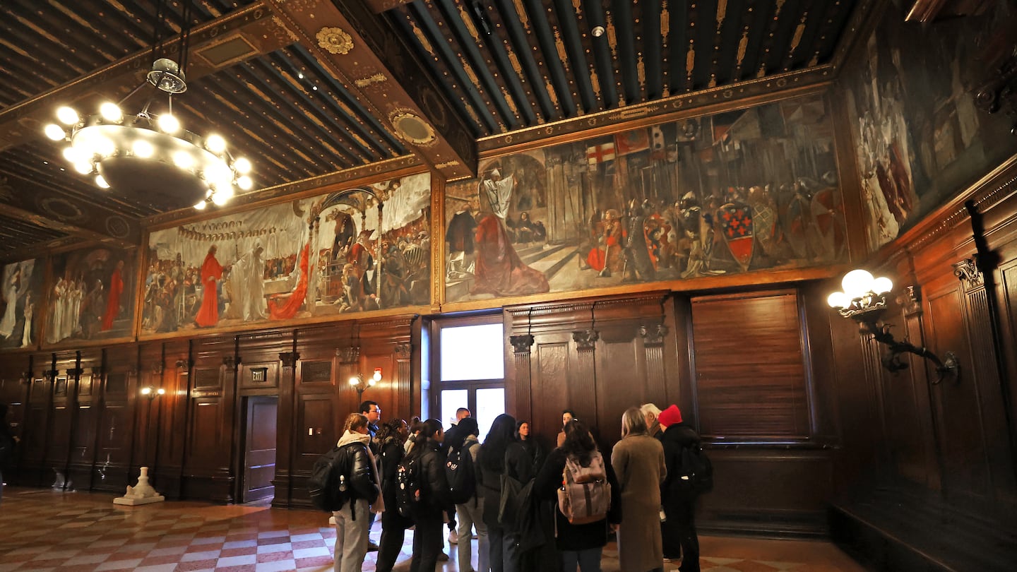 A tour group in the Abbey Room at the central branch of the Boston Public Library this month.