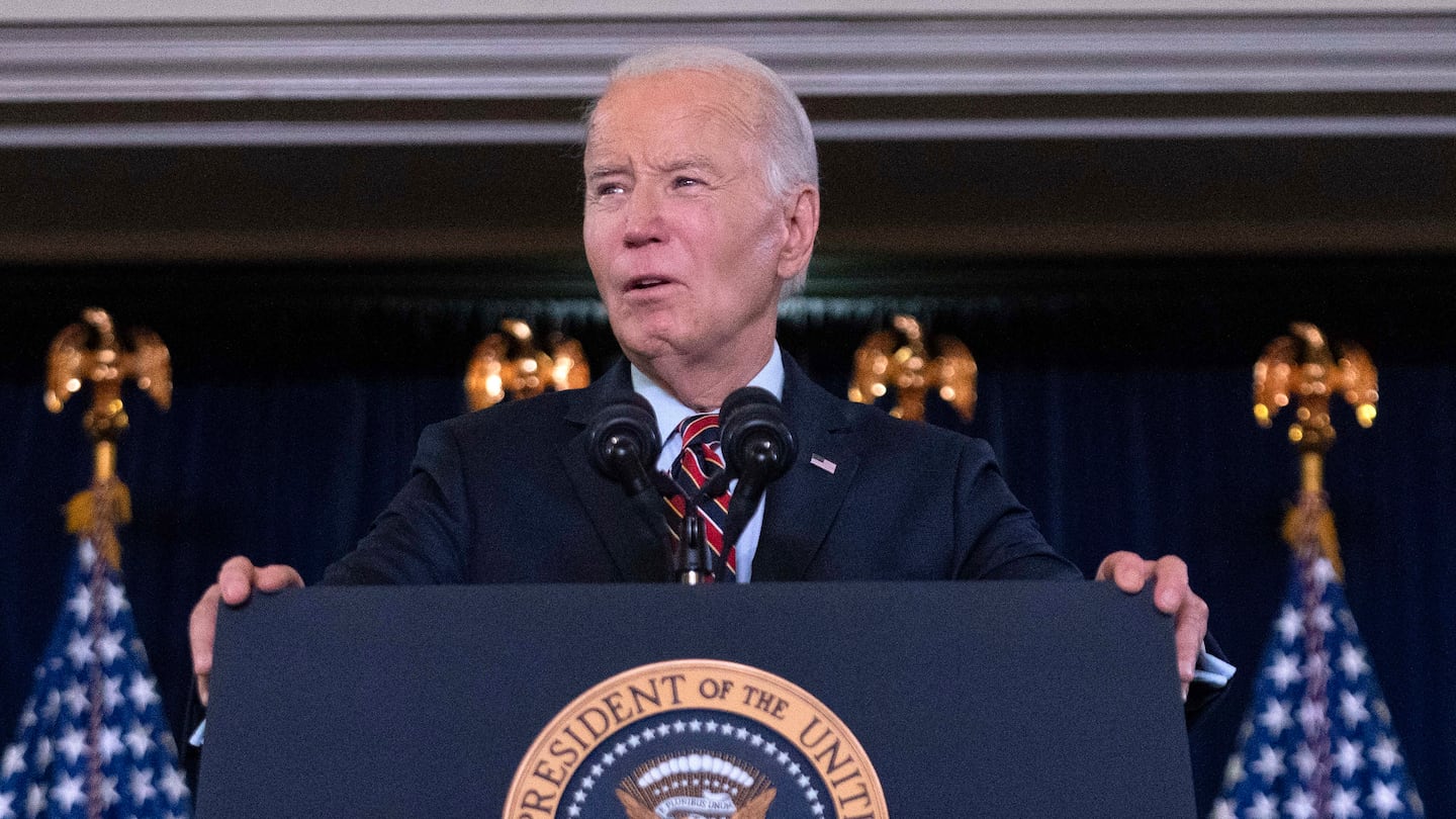 President Biden delivers his remarks at the Democratic National Committee's Holiday Reception at Willard Hotel in Washington, on Dec. 15.