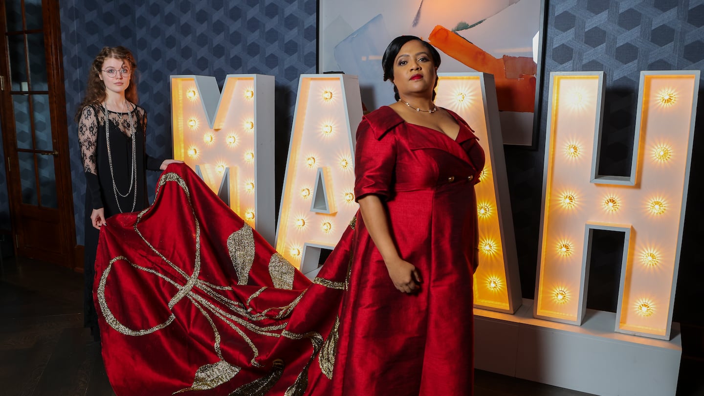 Noelle Trent, president and CEO of the Museum of African American History Boston and Nantucket, wearing a one-of-a-kind "Bridgerton"-inspired gown designed by Lasell student Hazel Nichol.