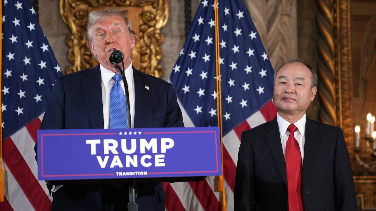 President-elect Donald Trump speaks during a news conference at Mar-a-Lago, Monday, Dec. 16, 2024, in Palm Beach, Fla., as SoftBank Group CEO Masayoshi Son listens.