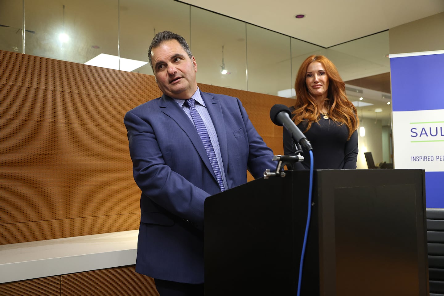 Mayor Carlo DeMaria of Everett and his wife, Stacy, held a news conference at his lawyer’s office to discuss the settlement.