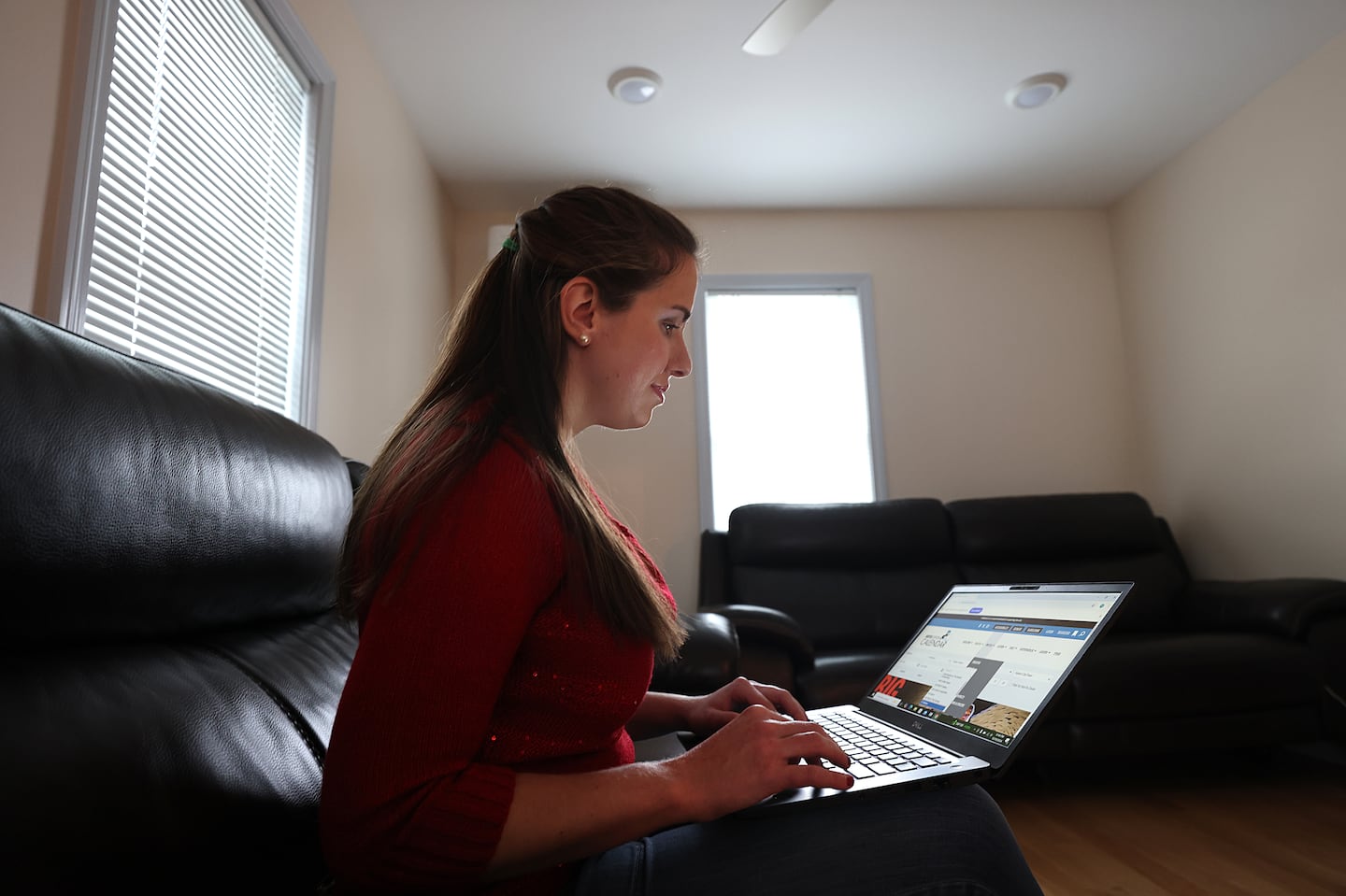 Tanja Milojevic, photographed at her home, helped beta test the new accessibility feature on the ArtsBoston Calendar website.