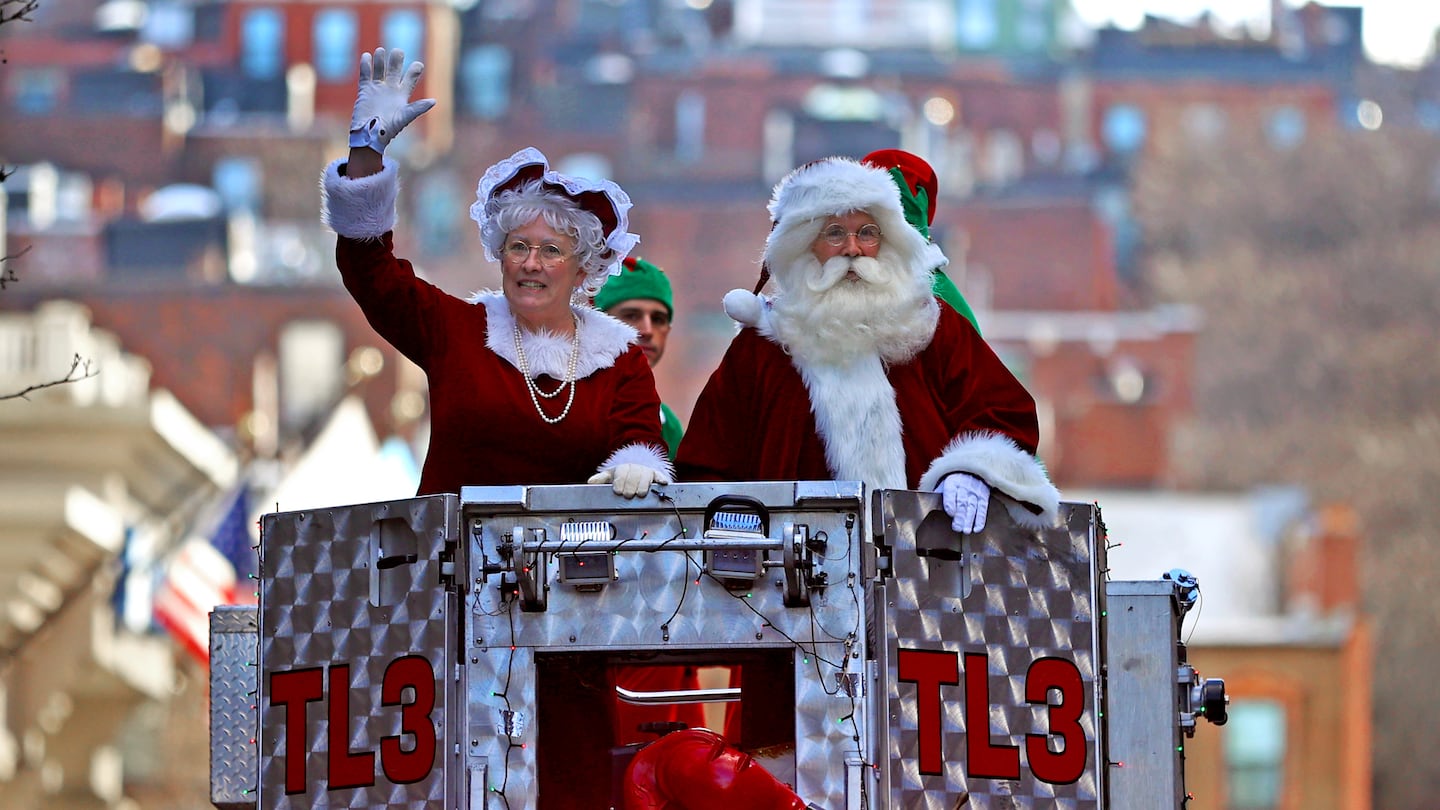 Christmas at the Shriners Hospital, Boston Fire department did their part delivering Santa and Mrs Claus.