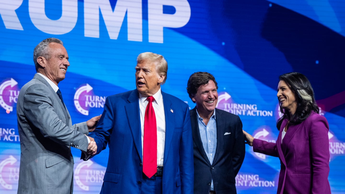 From left, Robert F. Kennedy Jr., Donald Trump, Tucker Carlson, and Tulsi Gabbard spoke at a Turning Point Action Rally in Duluth, Ga., in October.