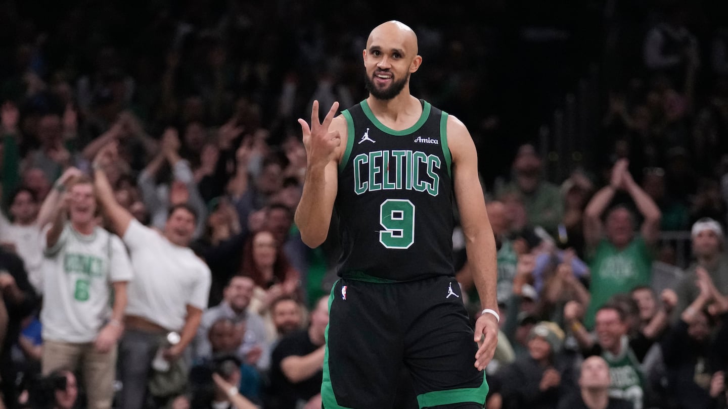 Celtics guard Derrick White celebrates after hitting, what else?, a 3-pointer earlier this season. Boston takes, and makes, more threes than anybody in the NBA. 