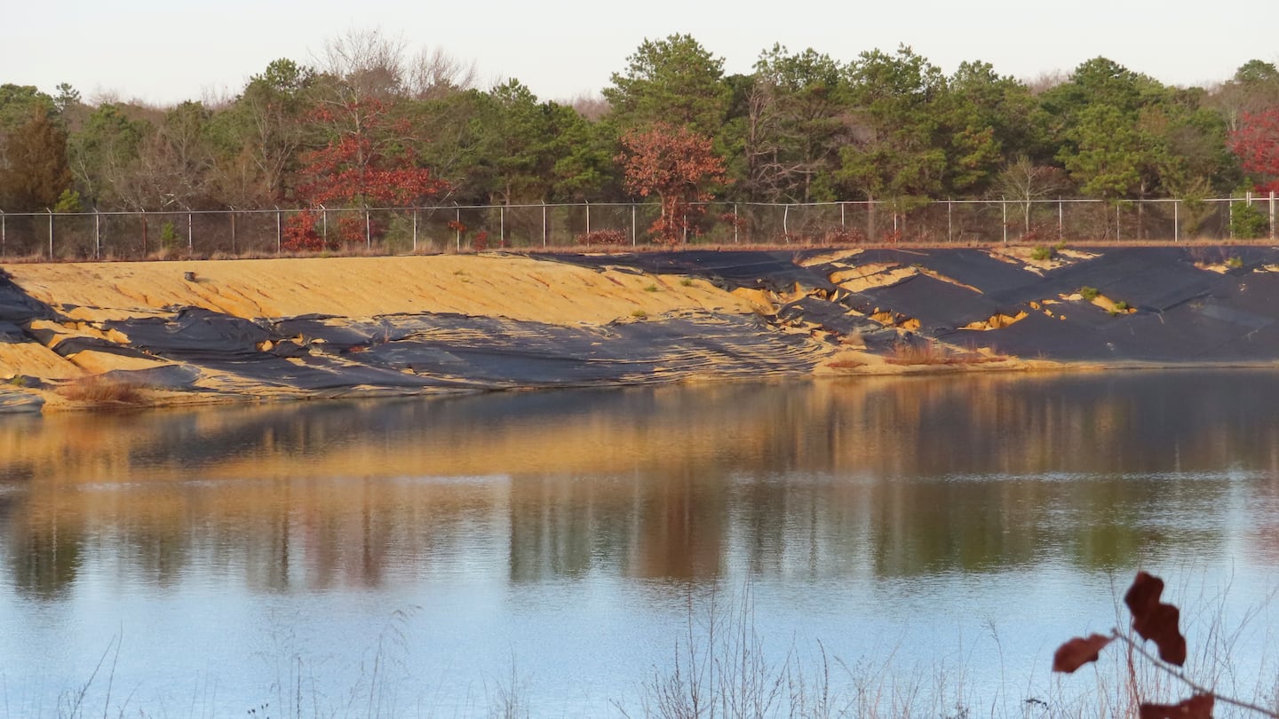 Water sits in a lined pit at the former Ciba-Geigy chemical plant on Dec. 17, in Toms River, N.J., one of America's most notorious toxic waste sites.