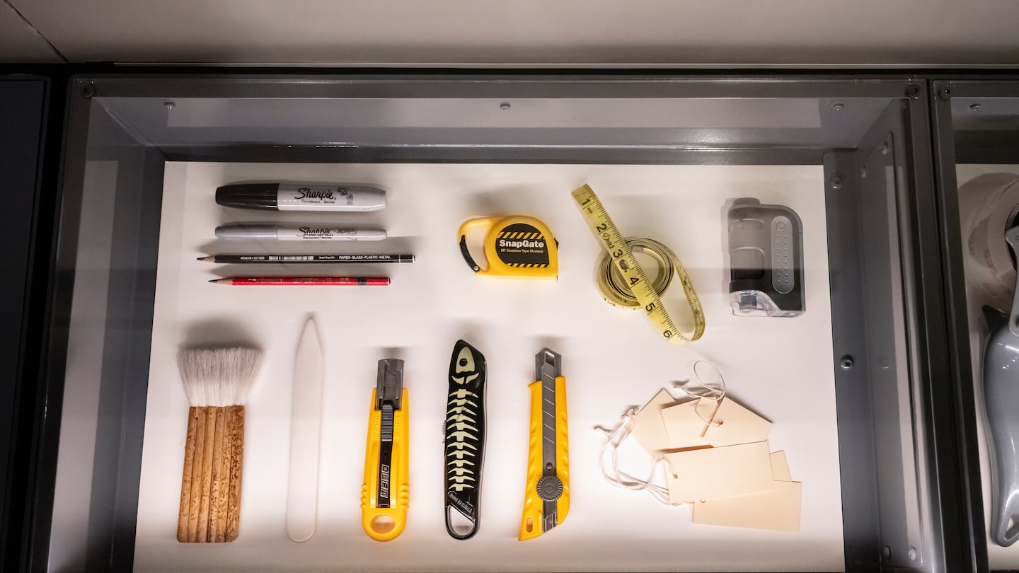 Display of tools in installation of new MIT Museum, part of "Moving Objects."