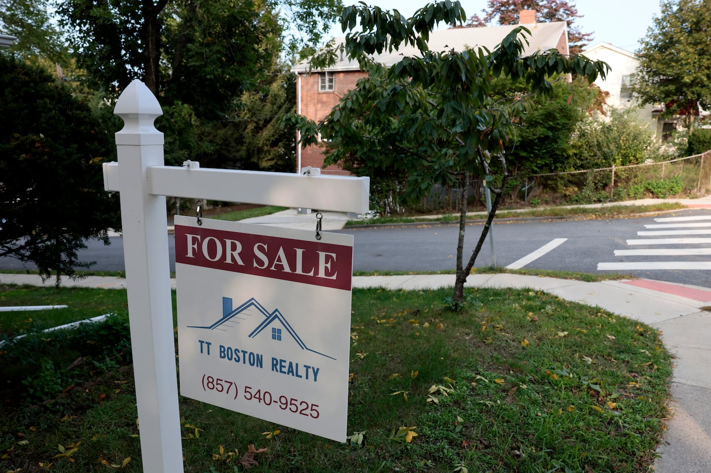 A "for sale" sign hung outside a home on Belmont Street in Watertown in 2023. According to new figures from the Greater Boston Association of Realtors this week, only 835 homes were sold throughout the region last month.