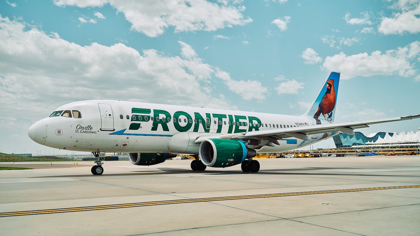 A Frontier Airlines plane at Denver International Airport. This month, the carrier will begin direct service from Boston to Miami and Tampa.