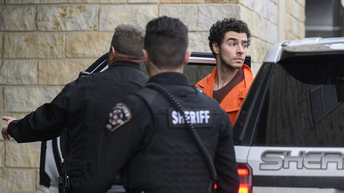 Police take Luigi Mangione into court in Hollidaysburg, Pennsylvania, on Dec. 10.