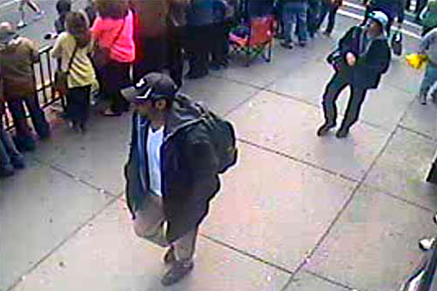 Tamerlan Tsarnaev, left, and Dzhokhar Tsarnaev at the Boston Marathon on April 18, 2013, on their way to place deadly bombs among the crowd of spectators. Dzhokhar Tsarnaev is one of 40 murderers in federal prison who have been sentenced to death.