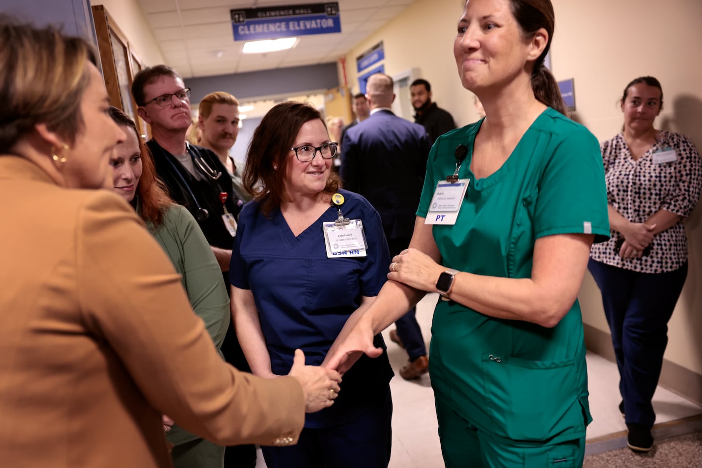 Governor Maura Healey (left) met with staff members during a ceremony at Saint Anne's Hospital in Fall River last month. The event marked Brown University Health’s acquisition of the former Steward hospital.