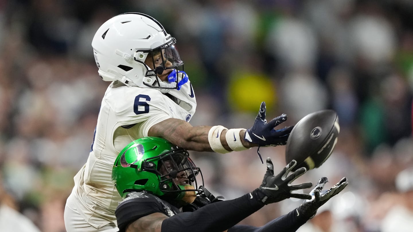 Nikko Reed (bottom) and Oregon might have won the Big Ten and are the top seed in the new 12-team College Football Playoff, but Harrison Wallace III (top) and Penn State still have a chance having earned the No. 6 seed.