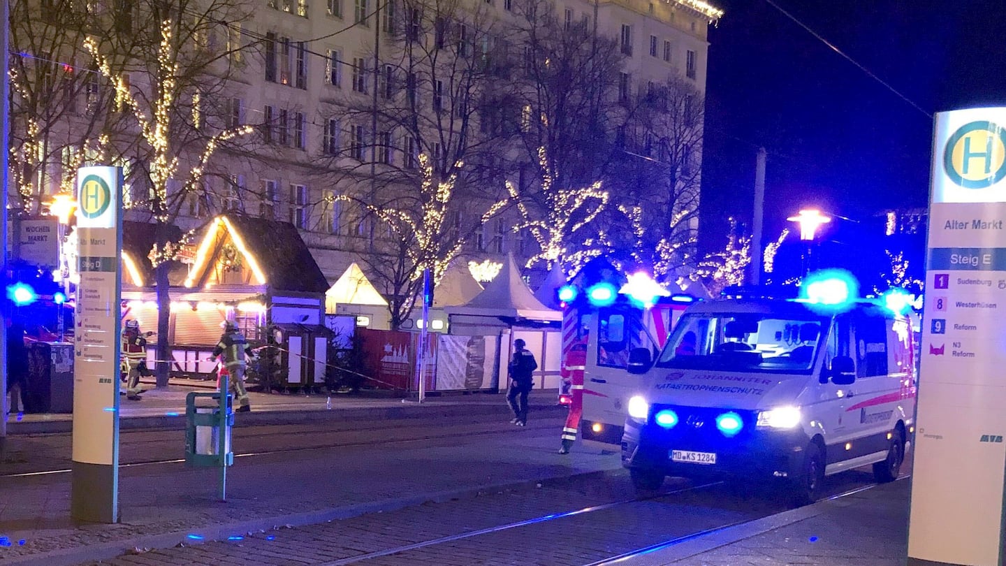 Emergency services attend an incident at the Christmas market in Magdeburg, Germany, on Friday. 