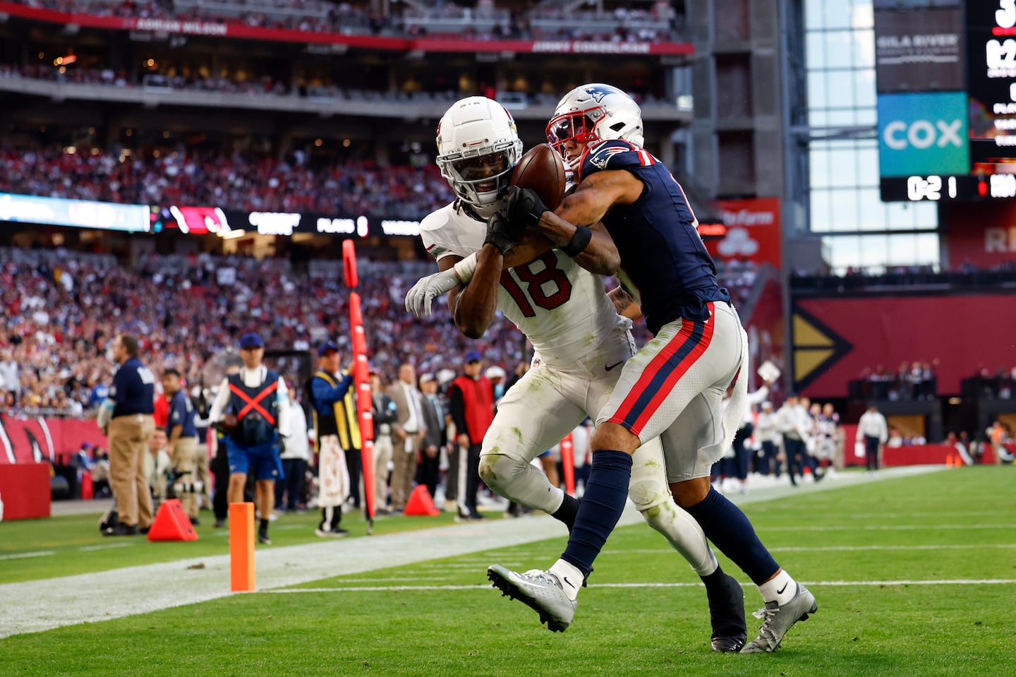 Patriots cornerback Christian Gonzalez (right) helped limit Cardinals wide receiver Marvin Harrison Jr. to just two catches last Sunday.